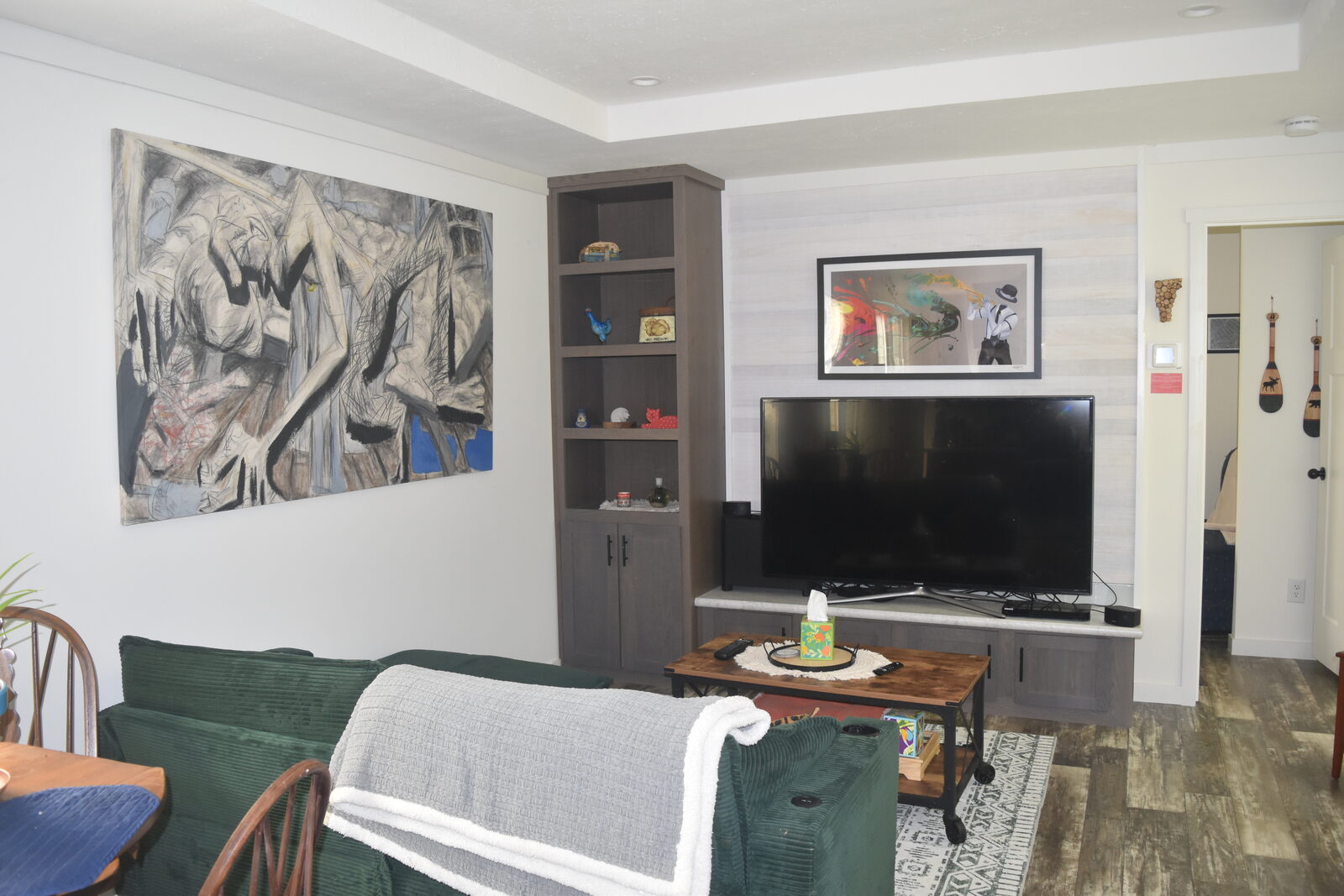 Unit A living room with TV and seating